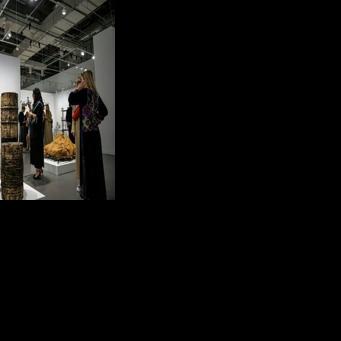 Visitors admiring the works of Bulgarian artist Christo