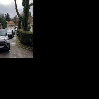 The US delegation leaves the Omani ambassador's residence in Geneva following talks via mediators with Iran's negotiating team