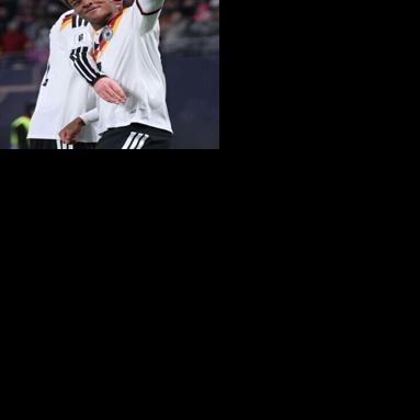 On their way: Teenager Assan Ouedraogo (front) celebrates scoring Germany's sixth goal against Slovakia