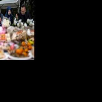 Indonesians in Hong Kong take part in a vigil for victims of the deadly fire