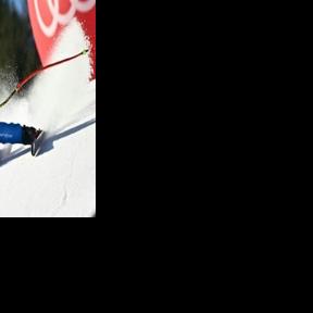 Italy's Giovanni Franzoni en route to winning the men's downhill in Kitzbuehel