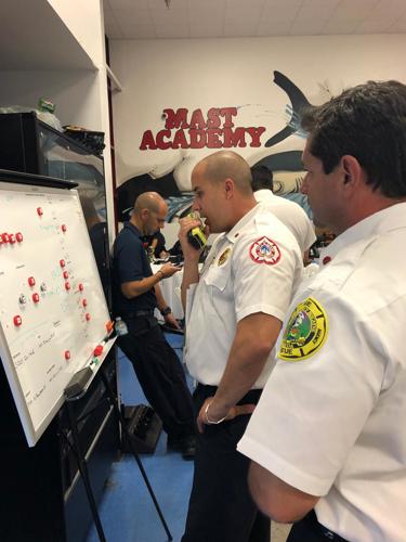 Deputy Chief Osorio at the Unified Command Post at Mast Academy.