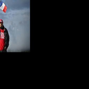 In France, riot police broke up a blockade by farmers at an oil depot in Bassens, near Bordeaux