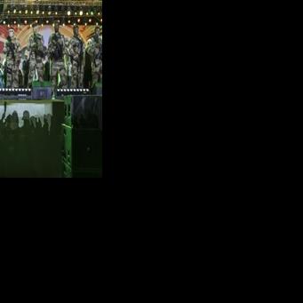 Members of the Guinea Special Forces unit stand guard during the final campaign rally of Guinean President and presidential candidate Mamady Doumbouya ahead of the country's presidential election in Conakry on December 25, 2025