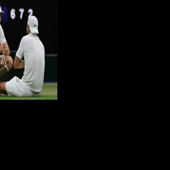 Jannik Sinner (left) consoles Grigor Dimitrov after the Bulgarian suffered an injury in their fourth-round match at Wimbledon