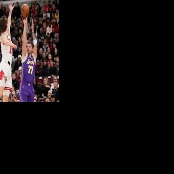Luka Doncic shoots over Chicago's Matas Buzelis on his way to 46 points in the Los Angeles Lakers victory over the Bulls
