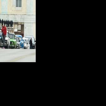 Vehicles wait in line to refuel at a gas station in Havana, with Cuba's communist government accusing US President Donald Trump of trying to 'asphyxiate' the island's economy