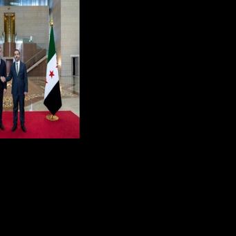 This handout photograph provided by the Turkish Foreign Ministry press service shows Turkish Foreign Minister Hakan Fidan meeting with his Syrian counterpart Asaad al-Shaibani in Damascus