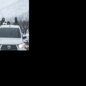 Syrian soldiers make their way through the country's mountainous Qalamoun region, near the border with Lebanon, on January 1, 2026