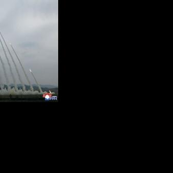 A training exercise of North Korean Army's 600mm-calibre ultra-precision multiple rocket launchers, at an undisclosed location in North Korea