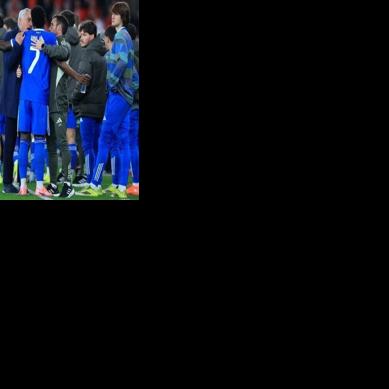 Real Madrid's Brazilian forward Vinicius Junior talks with Benfica's coach Jose Mourinho in the aftermath of the alleged first-leg racial abuse