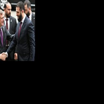 Syrian President Ahmed al-Sharaa is welcomed by German Foreign Minister Johann Wadephul ahead of a German-Syrian roundtable meeting