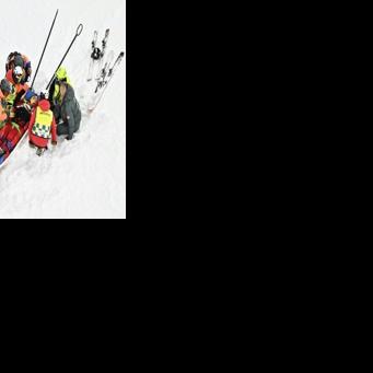 Canada's Cassie Sharpe receives medical assistance after crashing in the Olympic women's freeski halfpipe event