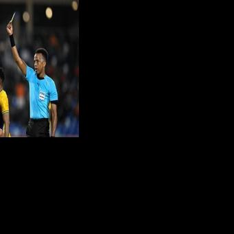 Somalia referee Omar Artan (R) will officiate at the 2026 World Cup finals