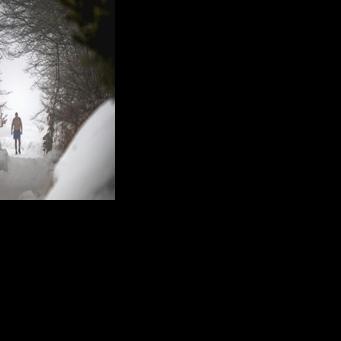 Archaeologist Vladimir Stevanovic, known on social media as 'Serbia's Iceman', hikes wearing only boots, shorts and a backpack in the middle of winter