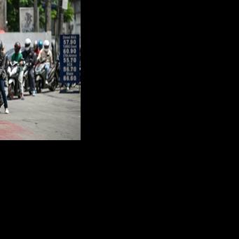Motorists queue at a gas station amid rising petrol prices in Quezon City, Metro Manila on March 9, 2026
