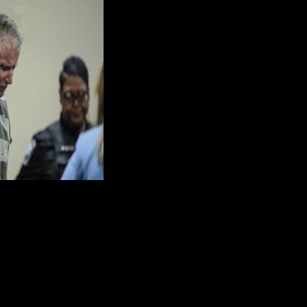 Colin Gray faces manslaughter and second-degree murder charges in connection with a shooting carried out by his son at a Georgia high school