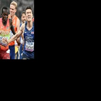 Portugal's Isaac Nader dips to deny Britain's Jake Wightman gold in a tight finish to the men's 1,500m at the world championships