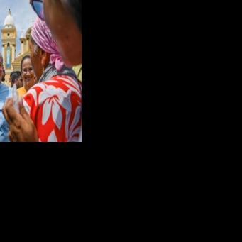 Venezuelan opposition figure Juan Pablo Guanipa greets supporters outside the Basilica of the Virgin of La Chinita in Maracaibo