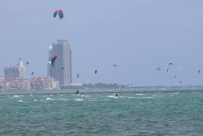 Council Hears Two Perspectives On Whether Kiteboarding Should Be Kite Surfers Practice Their Sport Against The Backdrop Of City Miami Skyline