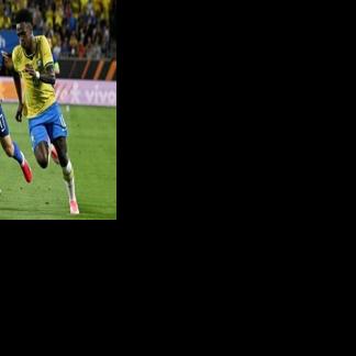 Brazil forward Vinicius Junior bursts away from Croatia's Petar Sucic during the South Americans' 3-1 friendly win in Orlando