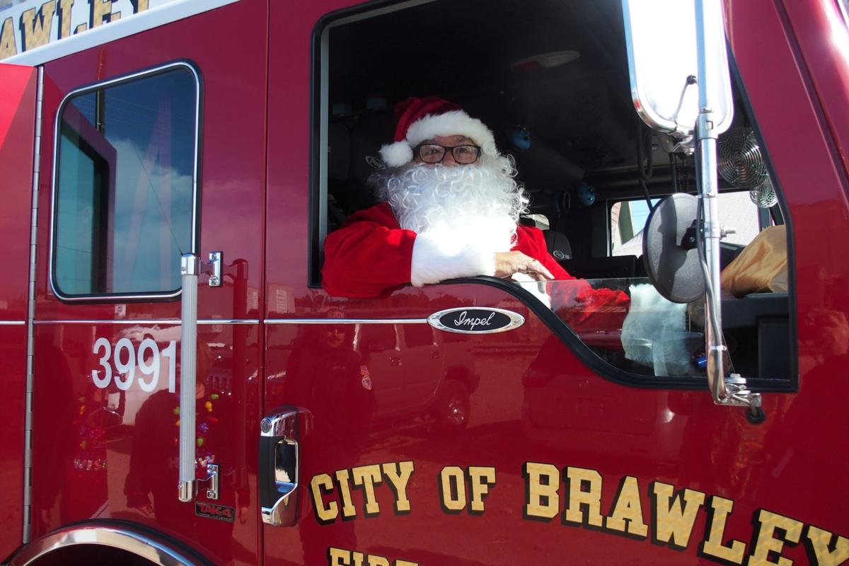 All about the smiles: Brawley club continues decades-old toy giveaway