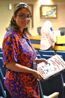 SBDC unveils bilingual Financial Literacy Book