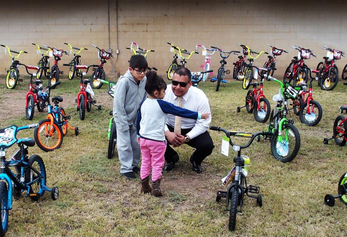 More than 100 kids receive new bikes for Christmas