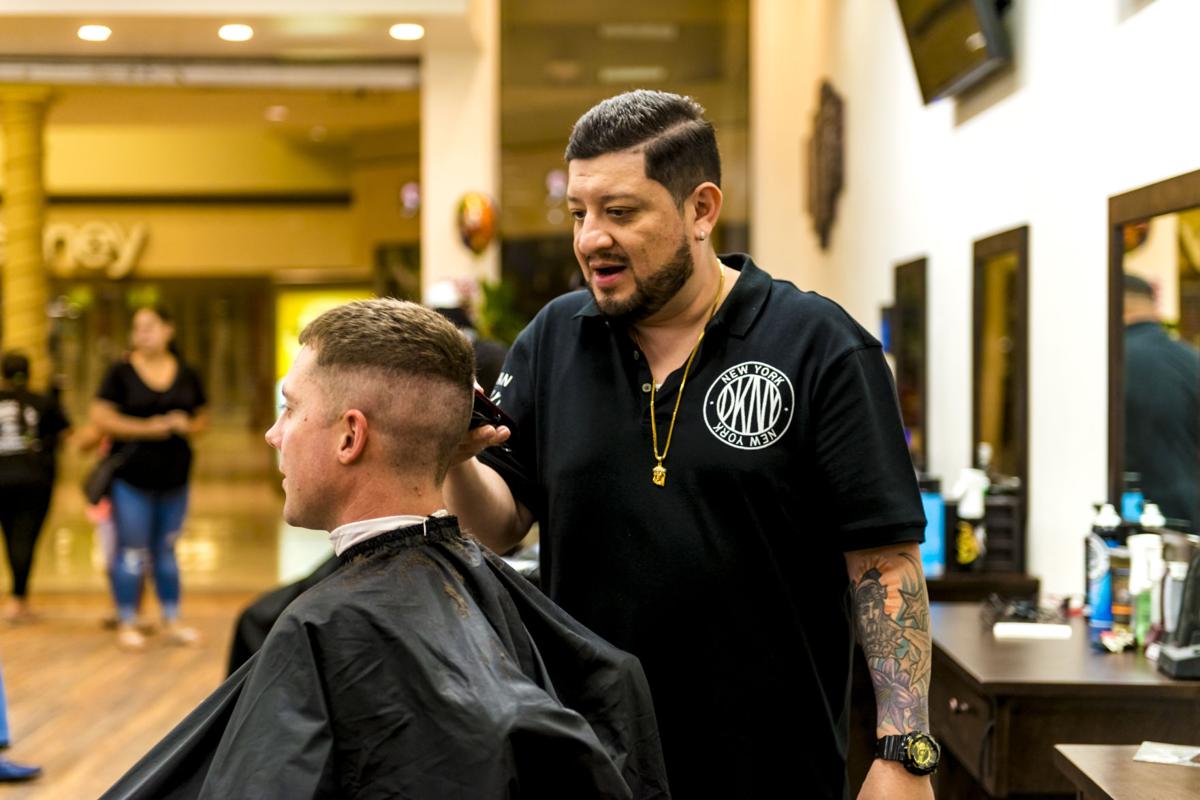 Headquarters Barbershop celebrated the grand opening of their new ...