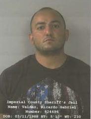 Brawley officer booked on rape charge