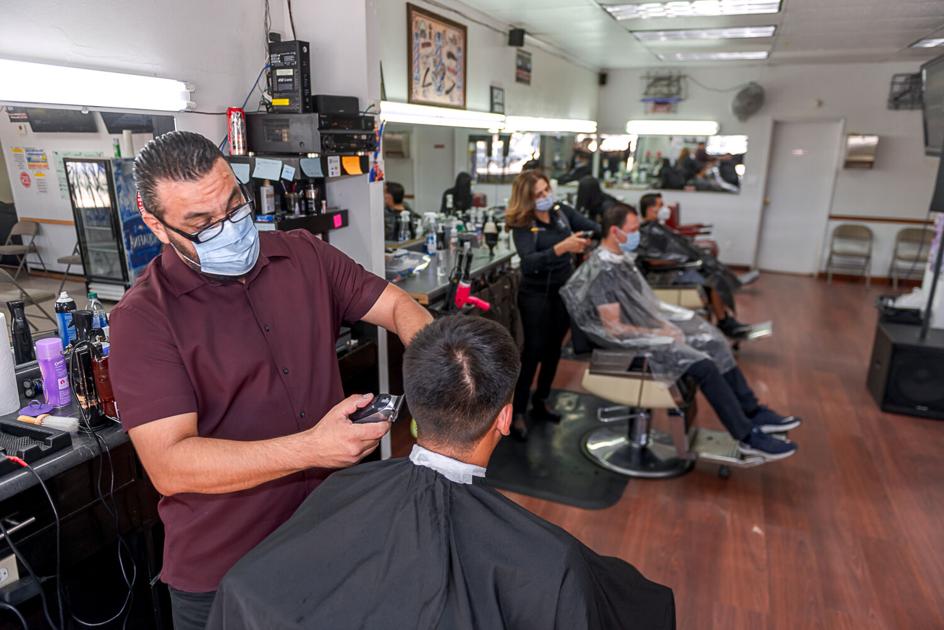 Barbers and clients celebrate reopening Local News