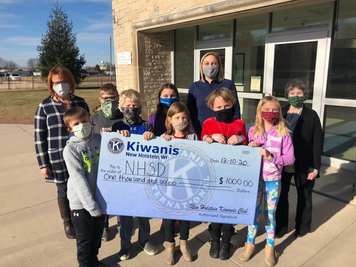 New Holstein Kiwanis Club helps buy school supplies News