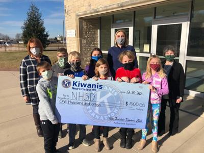 New Holstein Kiwanis Club helps buy school supplies