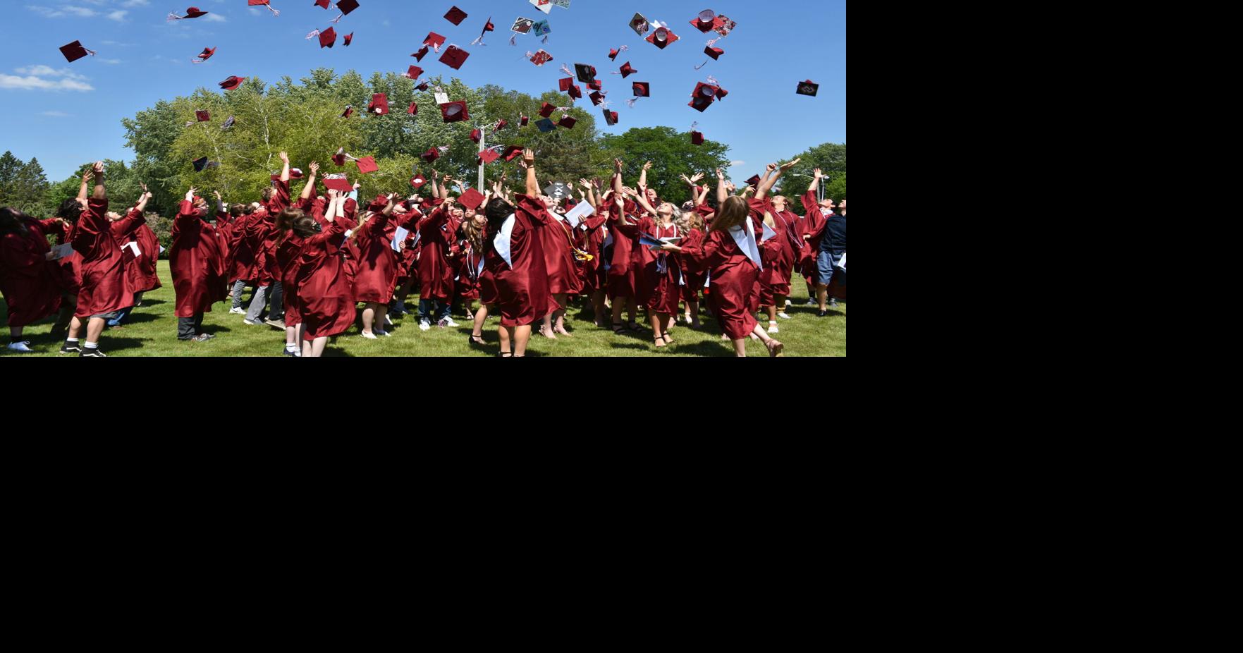 Traditional cap toss sends off New Holstein High School Class of 2021