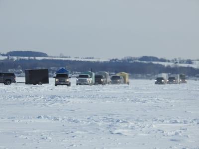 Vehicles line up to get ready for sturgeon spearing season