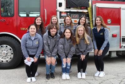 After winning State Kick again, CHS dance team gets fire truck ride to school