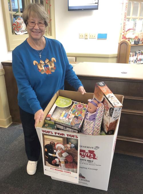 Butts County Library accepting canned food in place of fines, and toys for Toys for Tots
