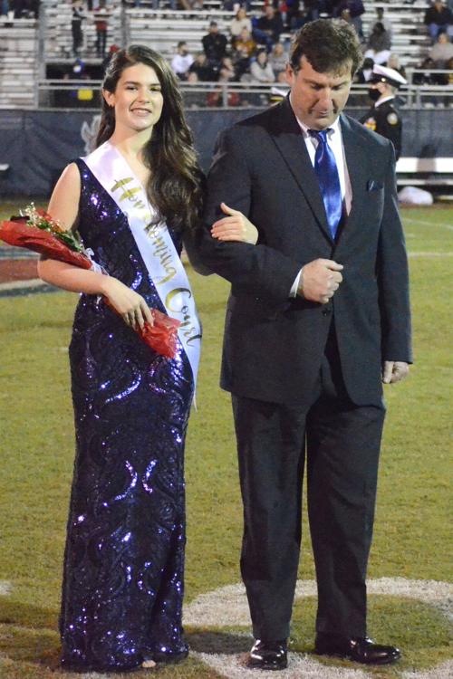 Ellie Mercer escorted by her father Jay Mercer.jpg