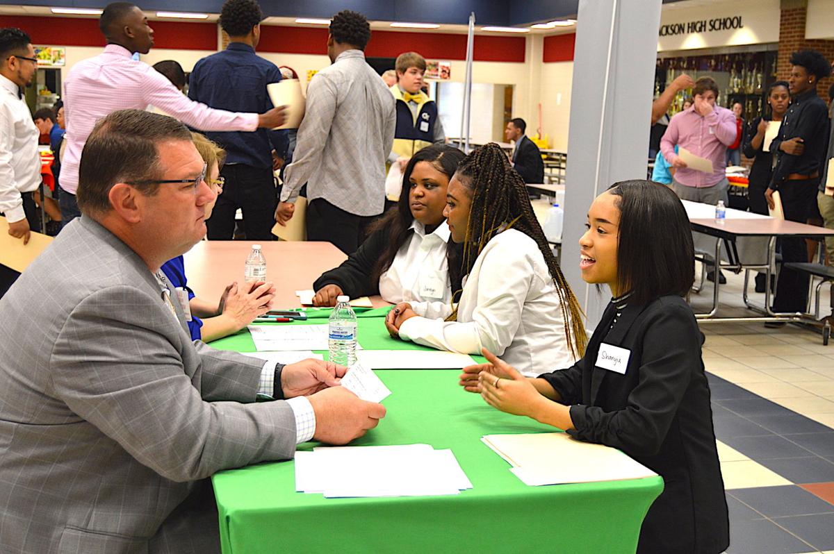 Students get interviewed during career fair