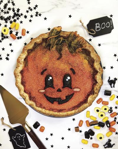Decorate a festive pie for Halloween party fun