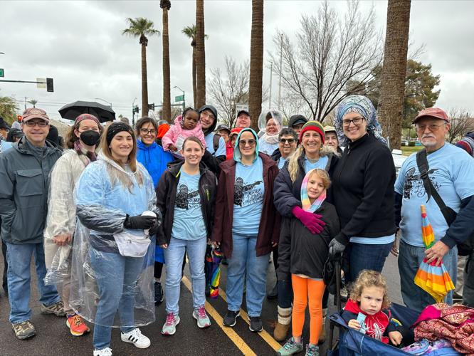People gather before the Martin Luther King Jr. Day march began on Monday, Jan. 16.