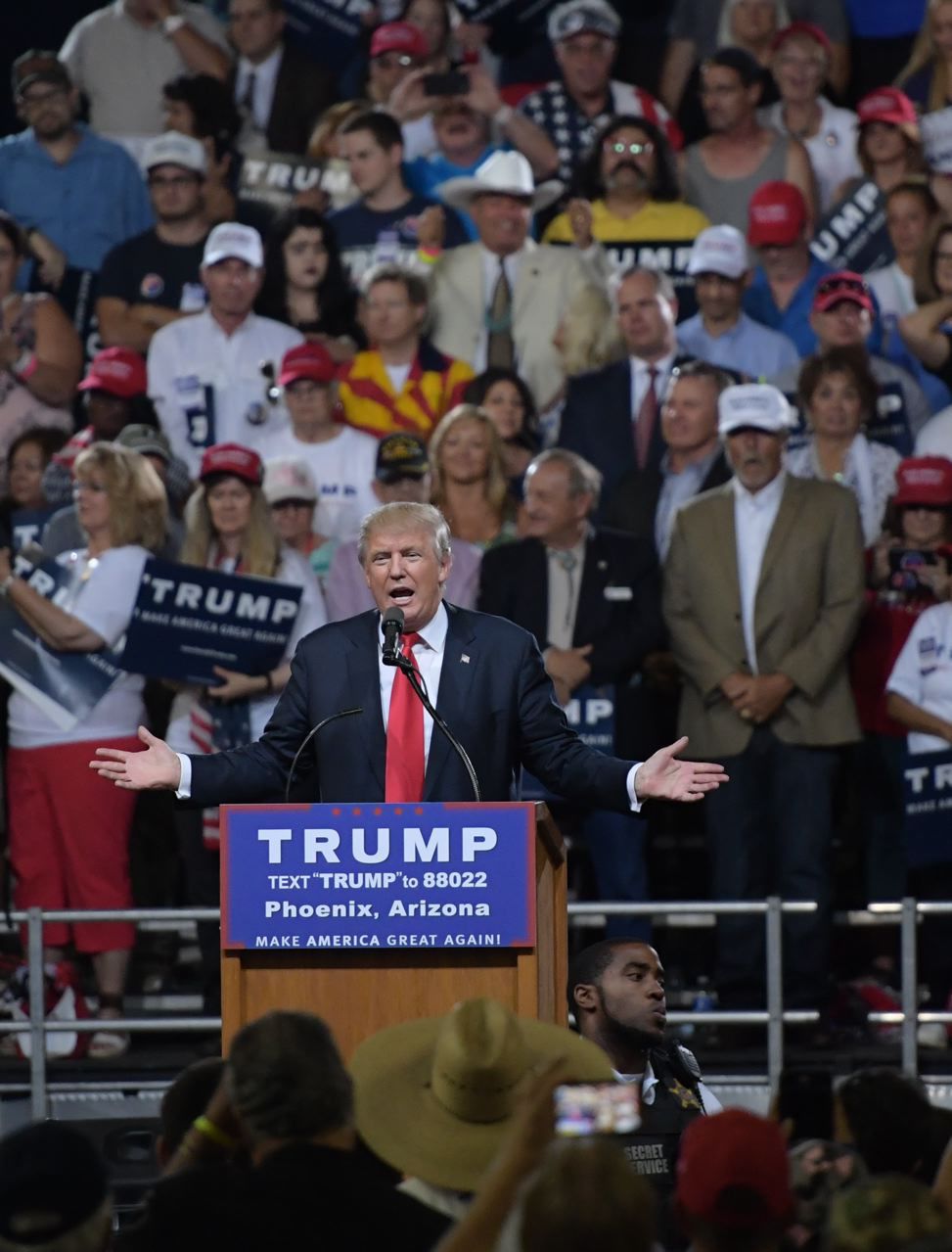 Watching Trump Speak From The Media Hot Seat Community