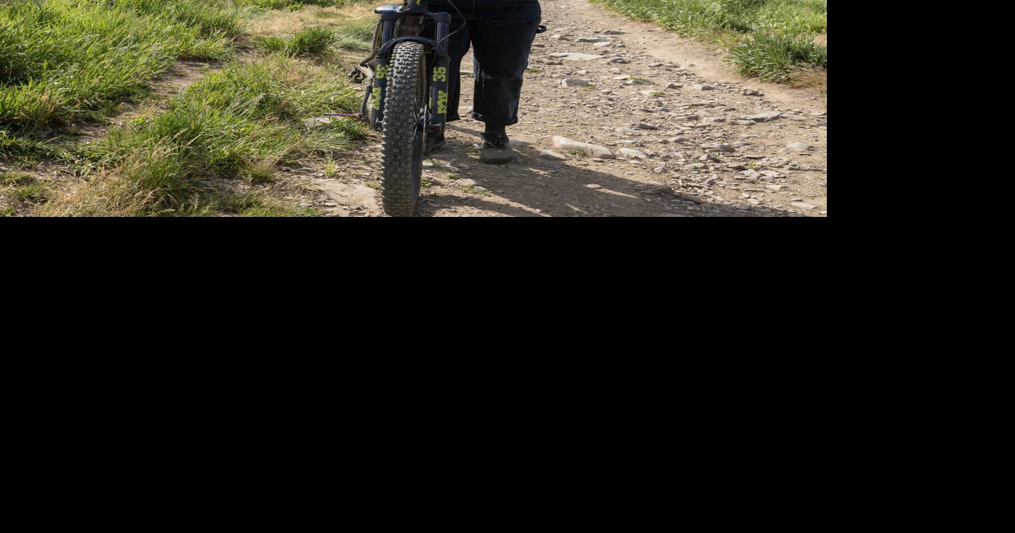 This mountain biker is avoiding Teton Pass. Health insurance was to blame.