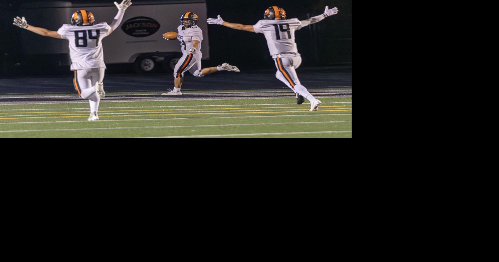 Jackson Broncs pop, punch, pick off Evanston in homecoming victory
