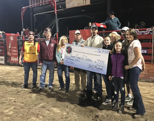 Snow Devils donate to Shriners