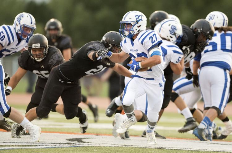 JHHS football | Sports | jhnewsandguide.com