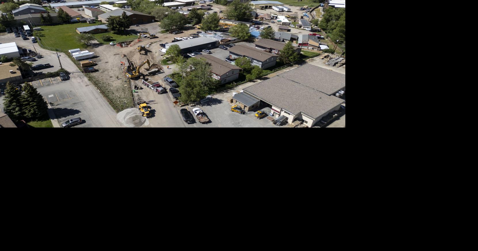 Gregory Lane open for business as construction moves north