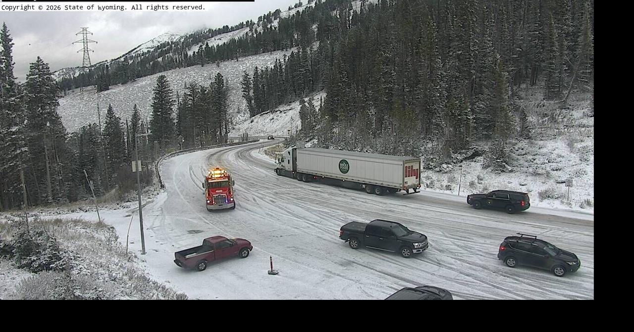 Semitruck stuck on slick Teton Pass as vehicles spin out