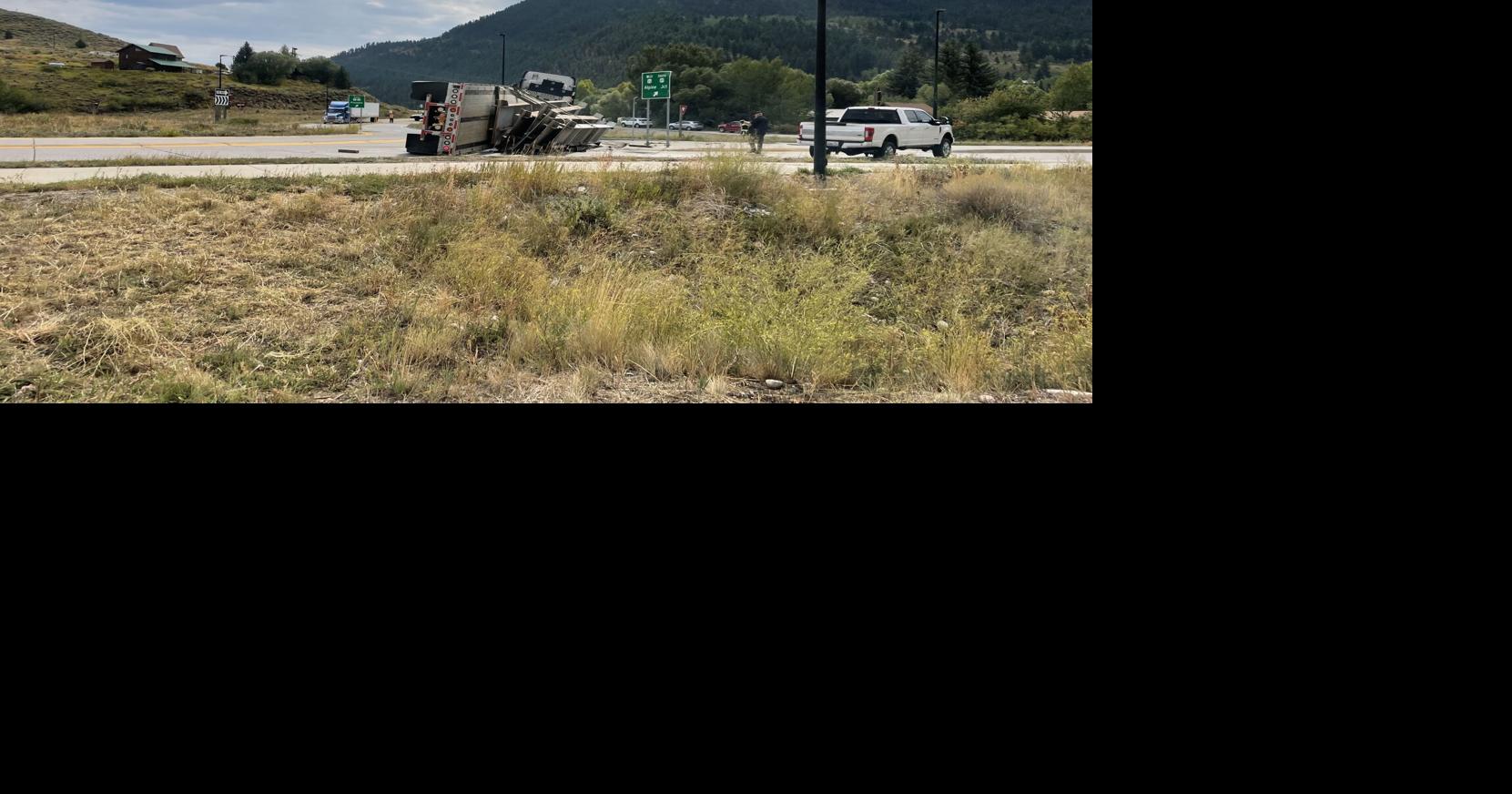Flipped semi blocks roundabout, gets fine | Local | jhnewsandguide.com