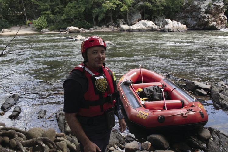 Search team scours banks of Nolichucky River for clues in missing